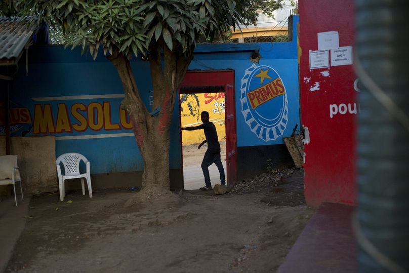 A man stands at the entrance of a bar in the DRC's Ituri province capital Bunia, August 2016