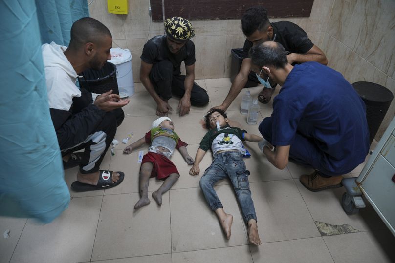 Palestinian children wounded in Israeli bombardment are brought to a hospital in Deir al Balah, south of the Gaza Strip, Thursday, Nov. 2, 2023.
