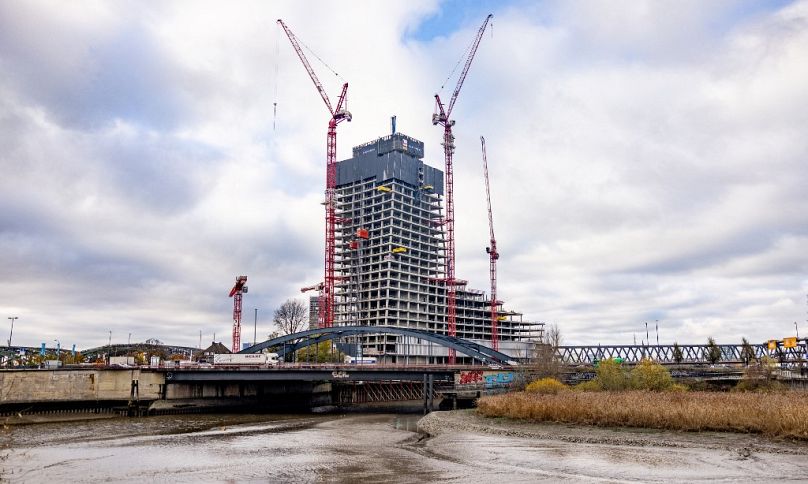 Picture taken on November 16, 2023 in Hamburg, northern Germany, shows the suspended construction site of the Elbtower, a project by Signa group,