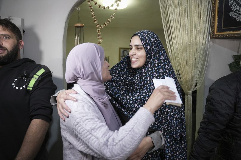 Marah Bakir, right, a former Palestinian prisoner who was released by the Israeli authorities, is welcome at her family house in the east Jerusalem neighborhood of Beit Hanina