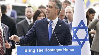 Israeli Foreign Minister Eli Cohen speaks about Israeli hostages being held by Hamas in front of United Nations headquarters in New York, Tuesday, Oct. 24, 2023. 