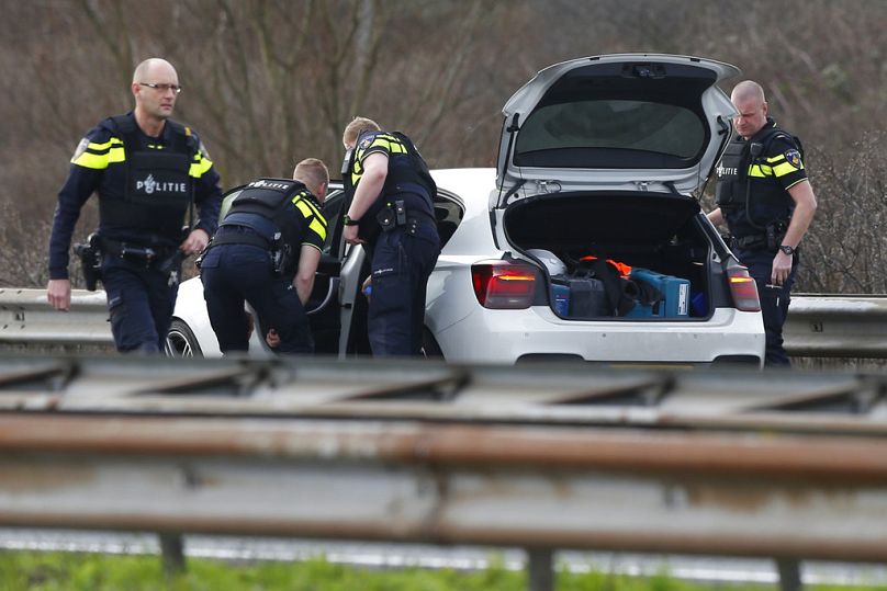 Dutch police search a vehicle on the A4 motorway near The Hague, March 2017