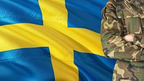 A compilation image showing the flag of Sweden and someone in a military uniform. 