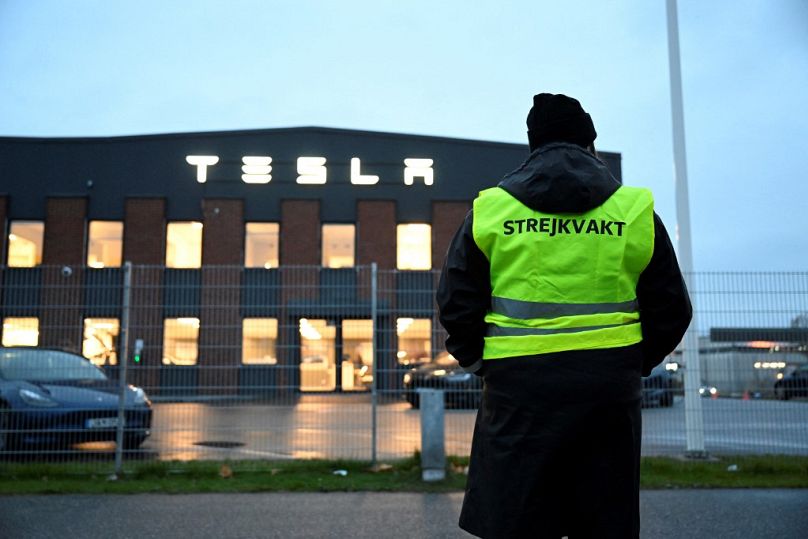 Emma Hansson, chairman of IF Metall Stockholms län stands in front of the electric car company Tesla's Service Center in Segeltorp, south of Stockholm.