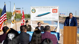 Gov. Lewis speaks during the signing of an agreement with the US Army Corps of Engineers to put solar panels over a stretch of irrigation canal on the tribe’s land.