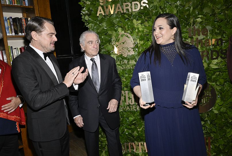 Leonardo DiCaprio, left, Robert De Niro and Lily Gladstone at the Gotham Independent Film Awards