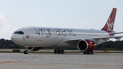 A Virgin Atlantic airplane on the runway. 