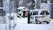 Finnish border guards and police at the Raja-Jooseppi international border crossing station in Inari, northern Finland, Friday, Nov. 24, 2023.