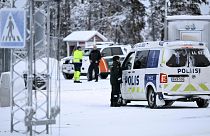 Finnish border guards and police at the Raja-Jooseppi international border crossing station in Inari, northern Finland, Friday, Nov. 24, 2023.