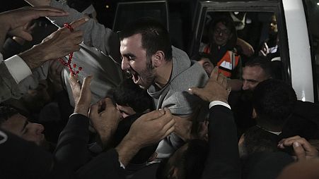 O regresso dos prisioneiros palestinianos a casa, libertados no troca por reféns israelitas