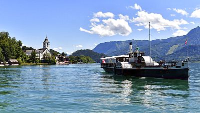 A pleasure boat is seen at the lake Wolfgangsee in St. Wolfgang, Austria, Monday, July 27, 2020. 