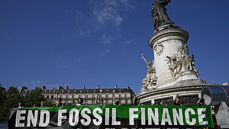 Green finance protestors in Paris, June 2023
