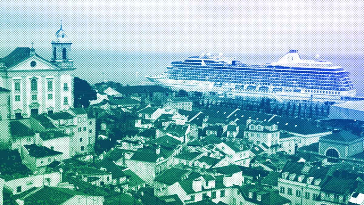 The cruise ship MS Marina is docked by Lisbon's old Alfama neighborhood, in the foreground, October 2022