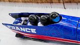 FILE: Team France slide during the 4-man bobsleigh at the 2022 Winter Olympics, Sunday, Feb. 20, 2022, in the Yanqing district of Beijing.