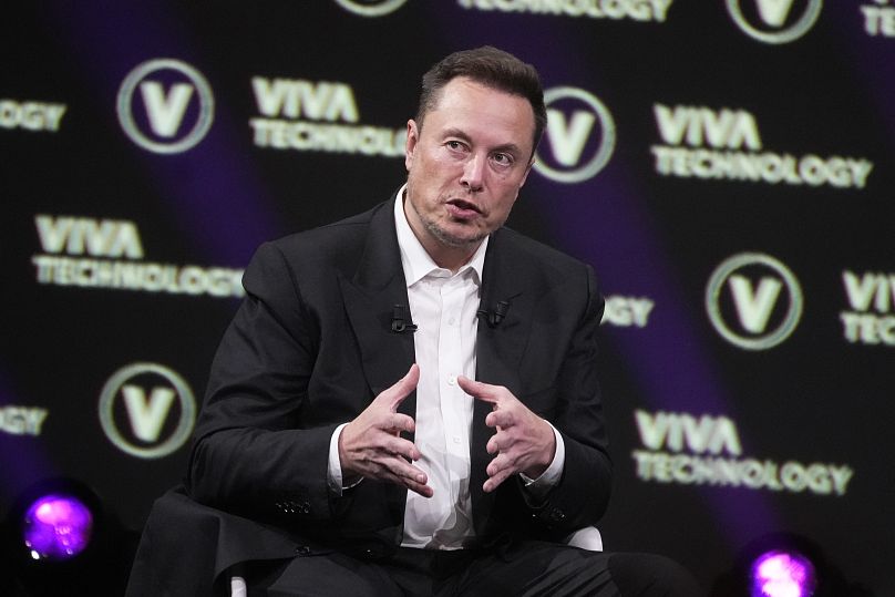 Musk uses expletive to tell audience he doesn't care about advertisers that fled X over hate speech
