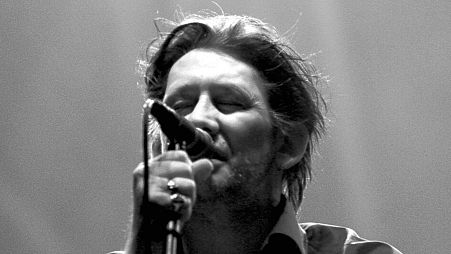 Lead vocalist Shane MacGowan of the Irish Celtic band The Pogues performs at a sold out Orpheum Theater in Boston, Tuesday, March 14, 2006.