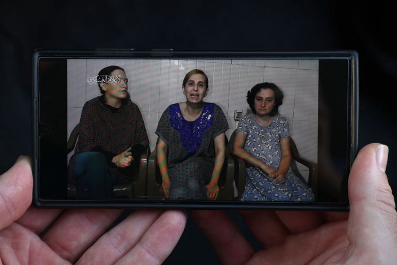 Released from captivity: (L-R) Rimon Buchshtab Kirsht (36), Danielle Aloni (44), Lena Trupanov (50) pictured on 30 October