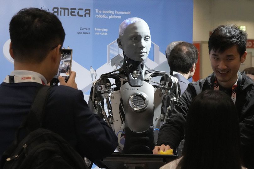 A robot designed by Engineers Arts and called AMECA, interacts with visitors during the International Conference on Robotics and Automation ICRA in London, May 2023
