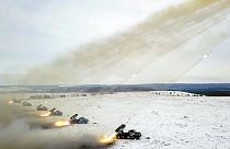 FILE - Russian Defense Ministry Press Service, Russian rocket launchers fire during military drills near Orenburg in the Urals, Russia, Thursday, Dec. 16, 2021. 