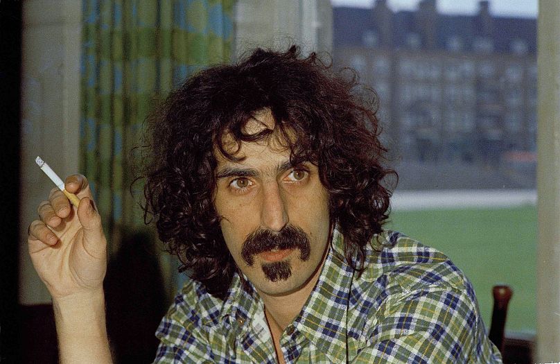 Frank Zappa, frontman of the Mothers of Invention, is shown enjoying a cigarette in Sept. 1972.