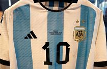 The shirt worn in the 2022 World Cup final match between Argentina and France on December 18, 2022, is displayed during a Sotheby's auction media preview. 