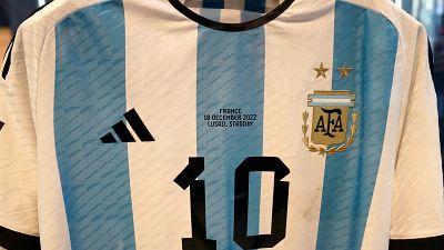 The shirt worn in the 2022 World Cup final match between Argentina and France on December 18, 2022, is displayed during a Sotheby's auction media preview. 