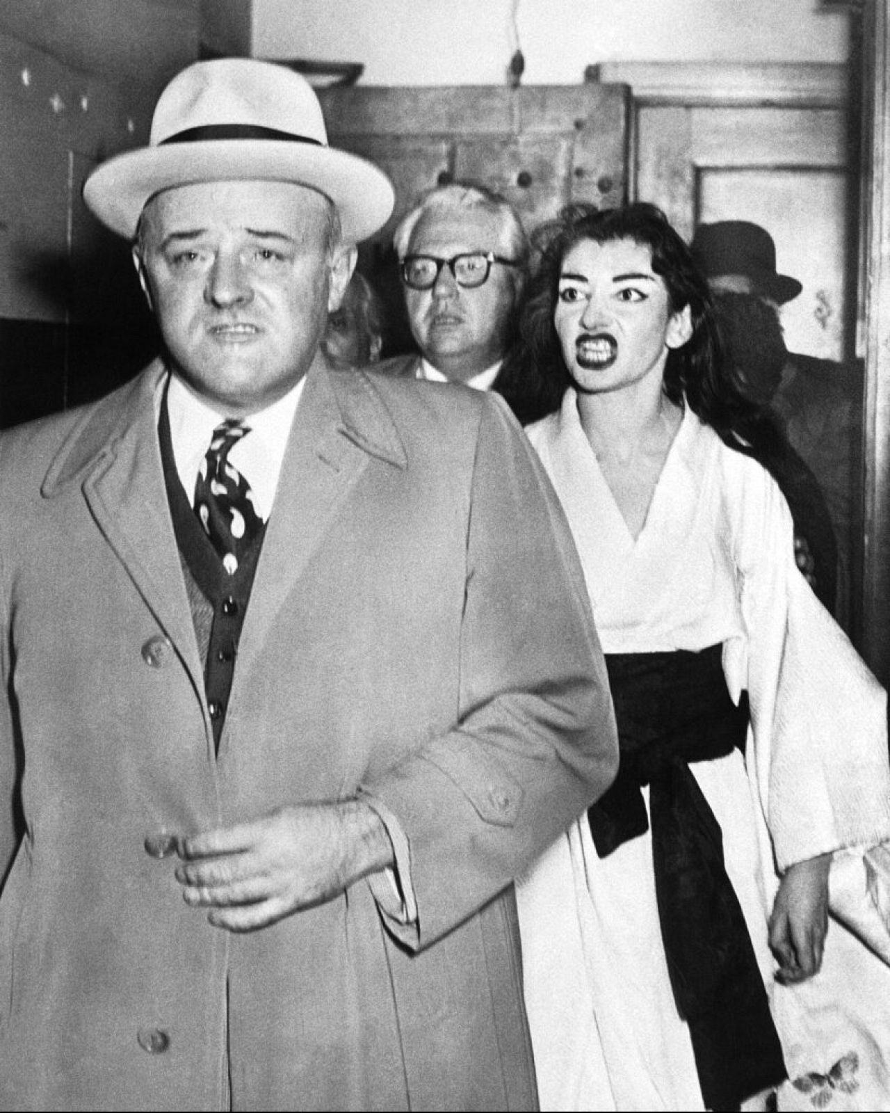 Callas confronts US Marshal Stanley Pringle, one of the servers trying to serve her summonses after her final "Madame Butterfly" performance at Civic Opera House, Chicago.
