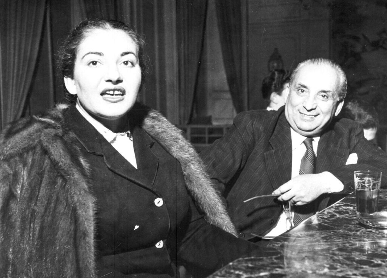 Greek opera star Maria Callas and her husband Giovanni Battista Meneghini, an Italian industrialist, in a Milan hotel, April 23, 1951.