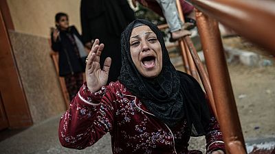 Relatives of the killed Palestinians mourn during a funeral ceremony after the Israeli attacks that continue in Khan Yunis, Gaza 