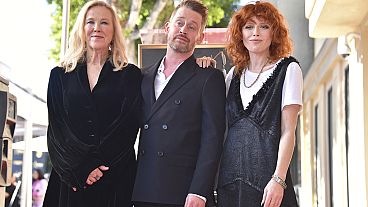 Catherine O'Hara, from left, Macaulay Culkin and Natasha Lyonne attend a ceremony honoring Culkin with a star on the Hollywood Walk of Fame on Friday, Dec. 1, 2023