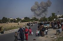 Palestinians flee from east to west of Khan Younis, Gaza Strip, during the ongoing Israeli bombardment, Saturday, Dec. 2, 2023