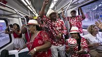 Salgueiro samba school members perform on the Samba Train celebrating National Samba Day, in Rio de Janeiro, Brazil, 2 Dec, 2023. 