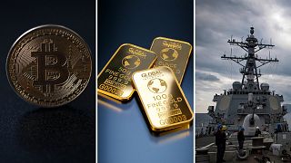 Bitcoin and gold bars, and the the USS Carney in the Mediterranean Sea (photo made on 12 November, 2018)