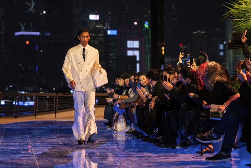 A model wears a creation designed by Pharrell Williams for Louis Vuitton during Men's Pre-Fall 2024 Fashion Show presented in Hong Kong, Thursday, 30 Nov 2023.
