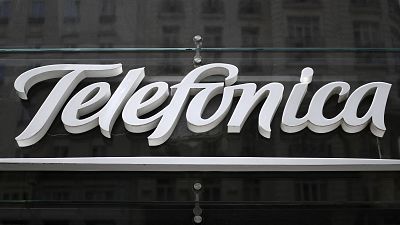 A picture shows the logo of Spanish multinational broadband and telecommunications company Telefonica in Madrid on August 23, 2018. 