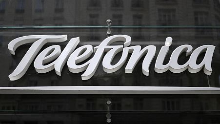 A picture shows the logo of Spanish multinational broadband and telecommunications company Telefonica in Madrid on August 23, 2018. 