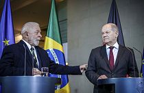 German Chancellor Olaf Scholz, right, and Luiz Inacio Lula da Silva, President of Brazil, hold a press conference at the Federal Chancellery in Berlin, Monday Dec. 4, 2023.