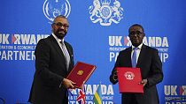 Britain's Home Secretary James Cleverly, left, and Rwandan Minister of Foreign Affairs Vincent Biruta