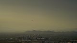 Las nubes rodean el centro de Phoenix (Arizona, EEUU) al atardecer, domingo 30 de julio de 2023.
