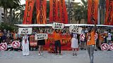 Activists protest against fossil fuels at the COP28 U.N. Climate Summit, Tuesday, Dec. 5, 2023,