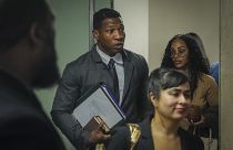 Actor Jonathan Majors, center, arrives at court for his domestic abuse trial - Tuesday 5 Dec. 2023, in New York
