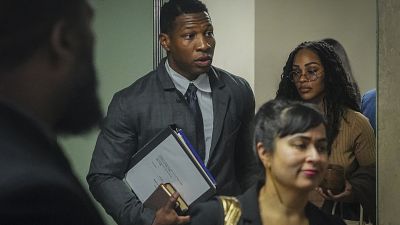 Actor Jonathan Majors, center, arrives at court for his domestic abuse trial - Tuesday 5 Dec. 2023, in New York