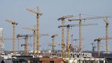 Construction cranes in Hamburg, Germany. March 18, 2022.