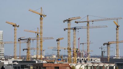 Construction cranes in Hamburg, Germany. March 18, 2022.