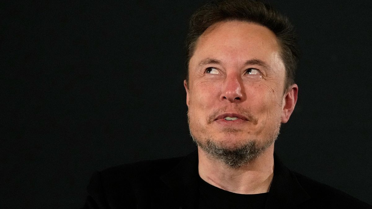 X (formerly Twitter) CEO Elon Musk gestures during an in-conversation event with Britain's Prime Minister Rishi Sunak in London on November 2, 2023, following the UK Artificia