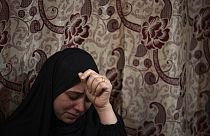 FILE- A Palestinian woman weeps during a funeral.