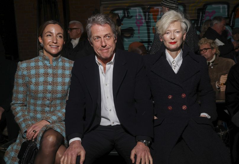 From left, Anna Elisabet Eberstein, Hugh Grant and Tilda Swinton got front row seats at the Chanel Metiers d'Art show in Manchester.