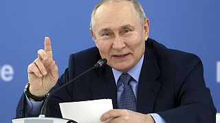 Russian President Vladimir Putin gestures while speaking at an exhibition at the Mashuk educational center in Pyatigorsk, Stavropol region, Russia on Tuesday