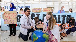 Protest action by International Federation for Medical Student Associations (IFMSA) at the UN Climate Change Conference COP28 at Expo City Dubai on December 6, 2023, in Dubai
