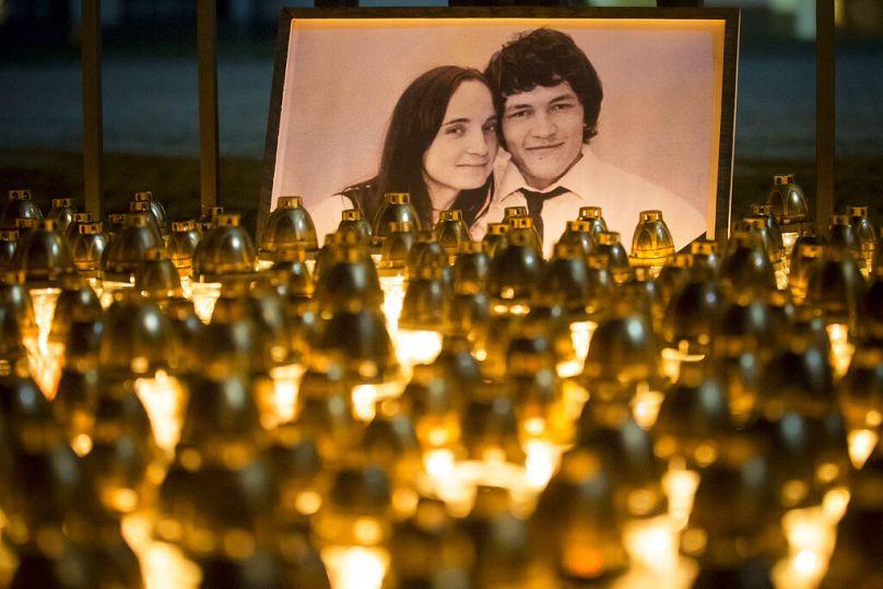 a silent protest in memory of murdered journalist Jan Kuciak and his girlfriend Martina Kusnirova, seen in photo, in Bratislava